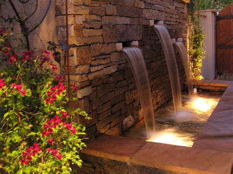 dancing light  pour  stone water feature backyard water feature