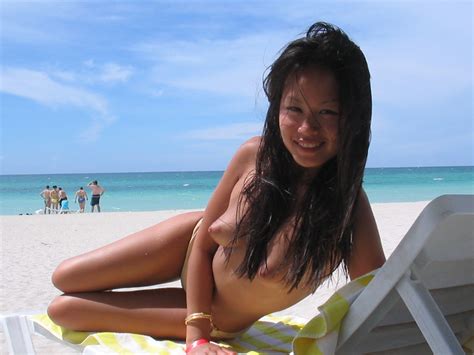 Cute Girl Enjoying Some Sun And Fun On The Beach Porn Pic
