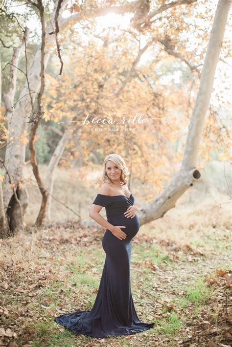 This Mama Is Stunning In Our Audrey Gown In Navy Fitted Off The