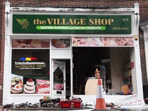 Norwich Residents Cover Romanian Shop Window In Supportive