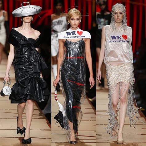 Models Wearing A Garbage Bag Dress With A Trash Can Lid