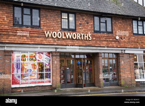 woolworths shop front  rare gold coloured signage haslemere surrey england stock photo