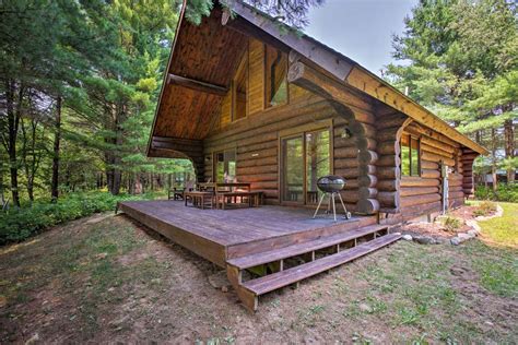 evolve secluded log cabin  nw michigan  deck evolve