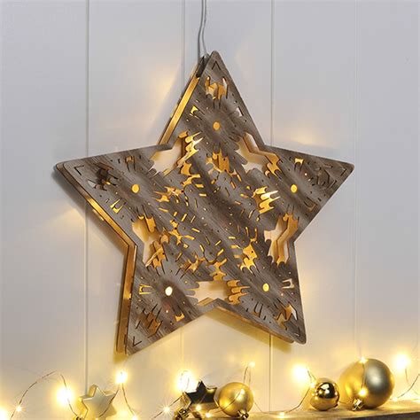 dekorativer led weihnachtsstern holzoptik leuchtstern fensterbild