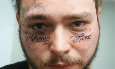 rapper with rose tattoo on face