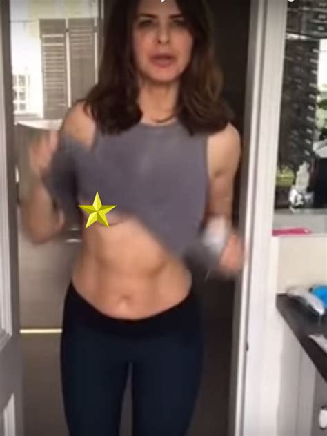awks trinny woodall flashes her boobs twice in video blog