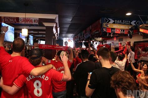 hundreds  liverpool fc fans crammed   raleigh bar