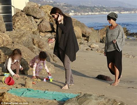 halle berry takes pyjama clad nahla for playtime on the beach daily mail online