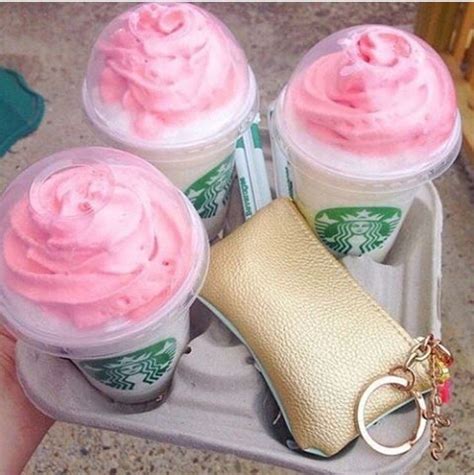 Starbucks Cup Keychains With Pink Frosting On Them And A Gold Purse Charm