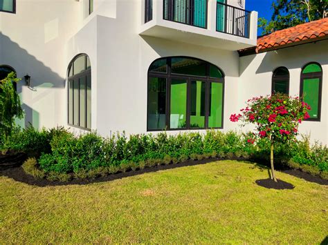 pink  green residential landscaping company landscapers