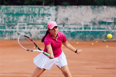 Tennis Player Female Player Dressed In Pink Skirt And