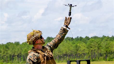 marines train  handheld swarming drones     fired  mm grenade launchers