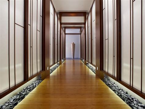 long hallway  wooden floors  white walls