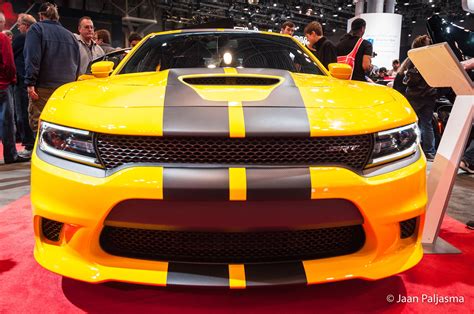 dodge charger  scat pack  yellow jacket color featuring  carbon stripes dodge