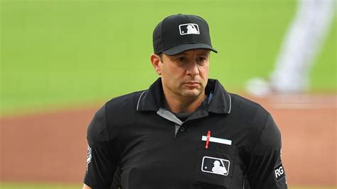 mlb umpires wear wristbands  protest abusive treatment