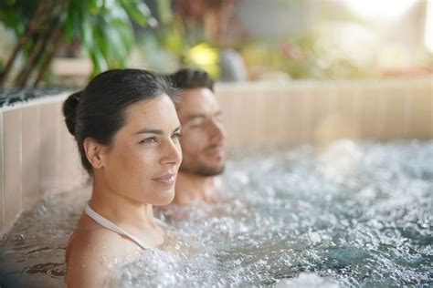 couple relaxing  spa resort hot spa  cities   years eve