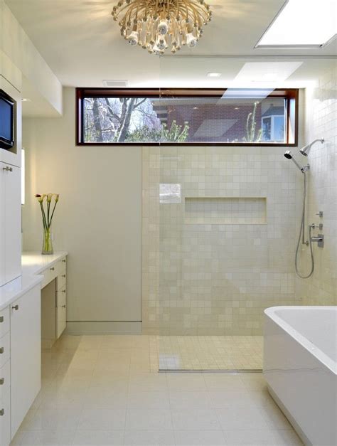pin  ashley dailey   house small bathroom window window  shower modern bathroom