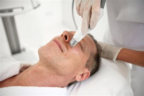 rejuvenating facial treatment mature man  lifting therapy