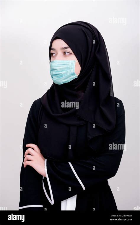 Muslim Girl Wearing Surgical Mask For Protection Hijab Woman Take A