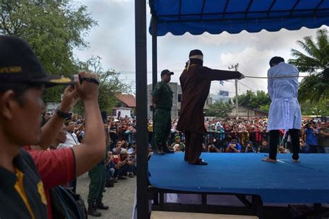 couples whipped in indonesia s aceh for public show of