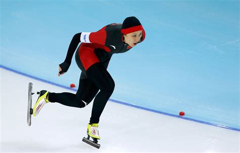 zhang wins china s first ever gold in olympic speed