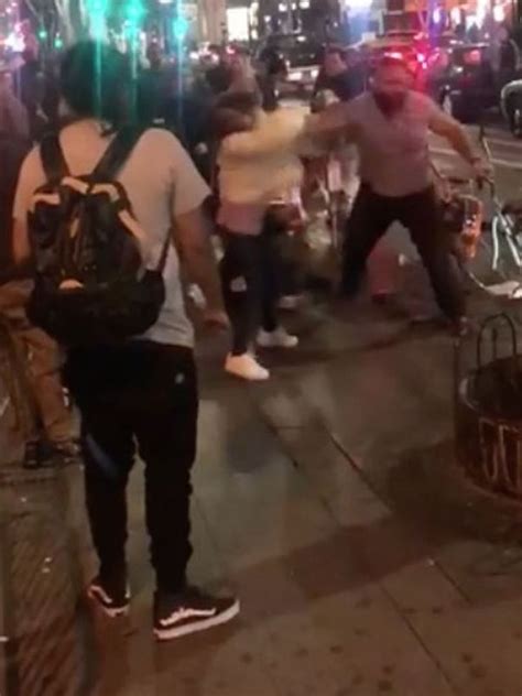 thug repeatedly punches women knocking them to ground as onlookers