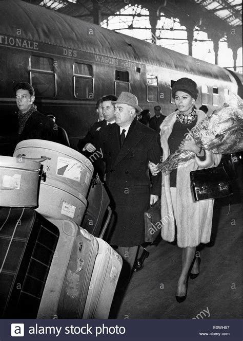 Actress Sophia Loren Arrives In Paris With Husband Carlo