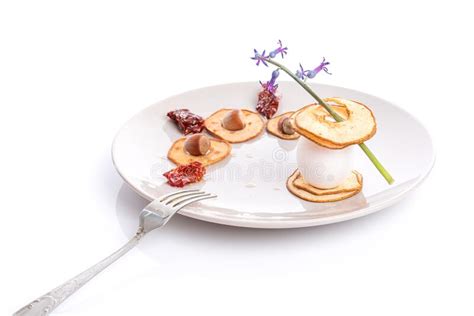 nutritious breakfast dried sliced pear  egg sun dried tomatoes  hazelnuts stock image