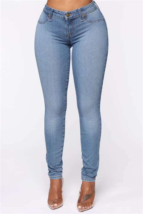 flex game strong low rise skinny jeans light blue wash fashion nova