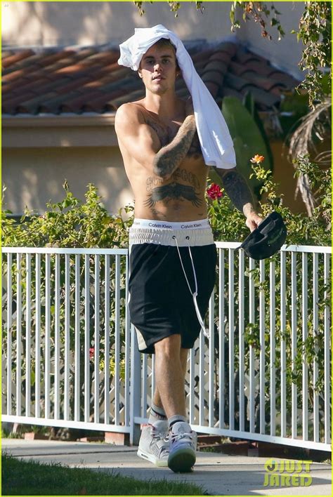 Shirtless Justin Bieber Shows Off Bulging Biceps And Toned Abs Photo