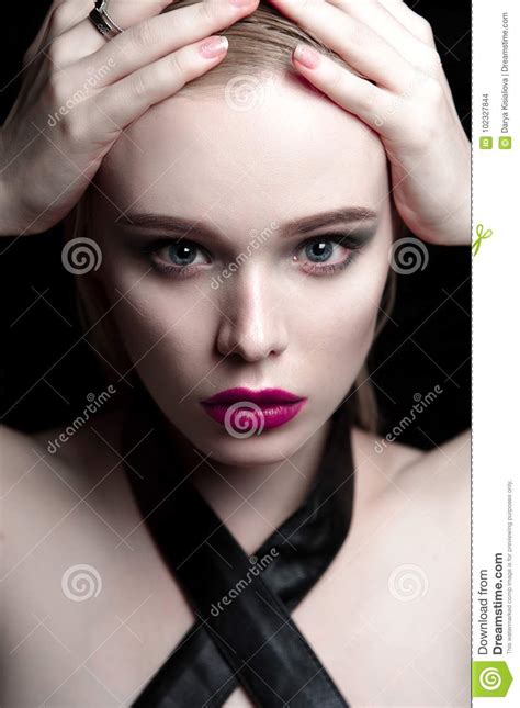 Portrait Of Beautiful Girl Model With Pink Lips And Blue Eyes With