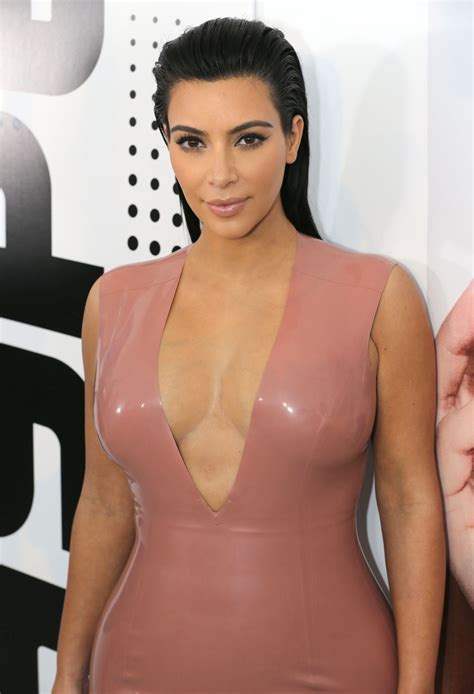 Kim Kardashian Shows Off Her Curvy Body Wearing A Tight Latex Dress At