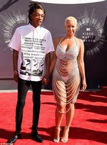 amber rose downplays her sex appeal in sporty jersey for
