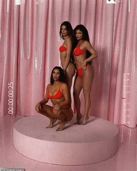 kim kardashian kendall and kylie jenner pose in very skimpy red