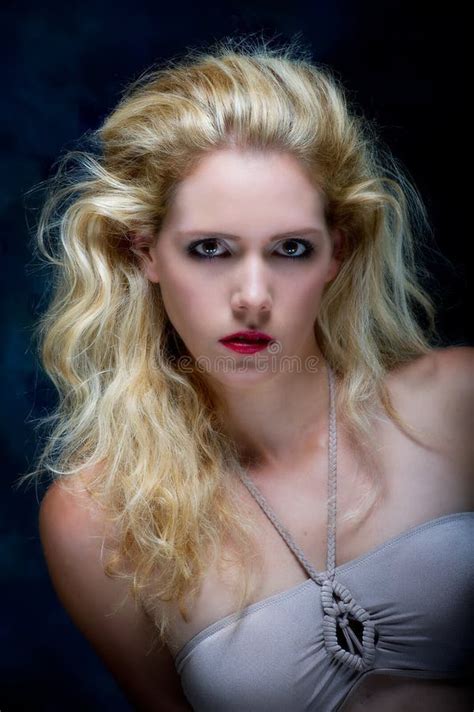 beautiful blonde female singer  blue dress stock photo image