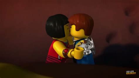 Two Legos Are Hugging Each Other In The Dark