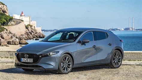 mazda  touring hatchback review bestseller eases  middle age  australian