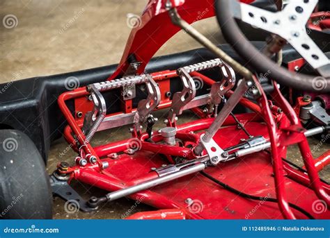 close  details  red mini gocart stock photo image  roll powered
