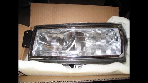 cadillac headlight replacement youtube