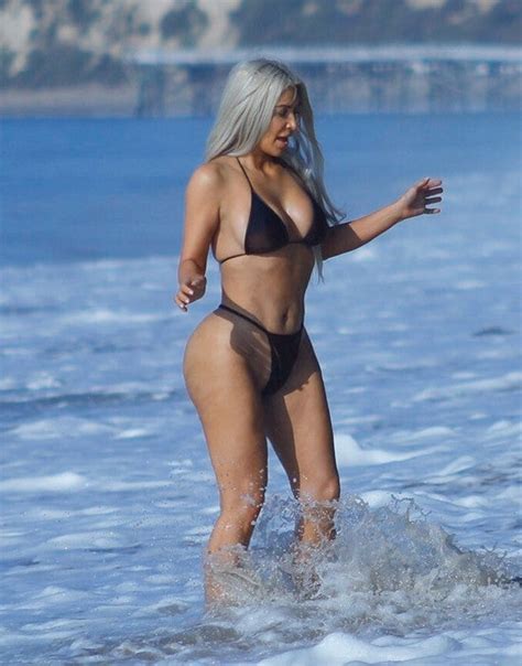 Kim Kardashian Shows Off Fit Bikini Bod While Soaking Up The Sun In