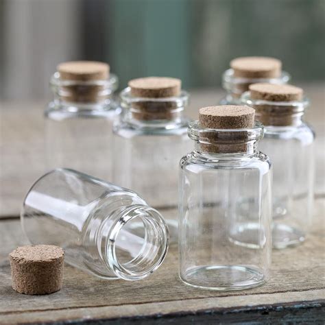 miniature corked glass bottles jars lids  pumps primitive decor