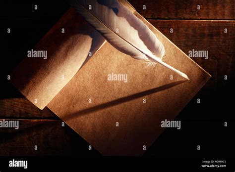 paper  quill   nice  wooden background stock photo alamy