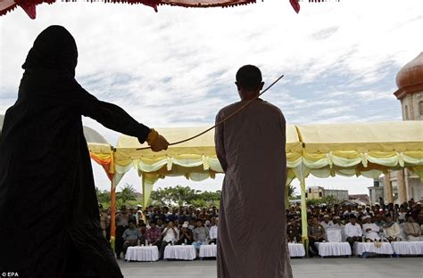 indonesia cane 32 men for violating aceh province s strict islamic laws daily mail online