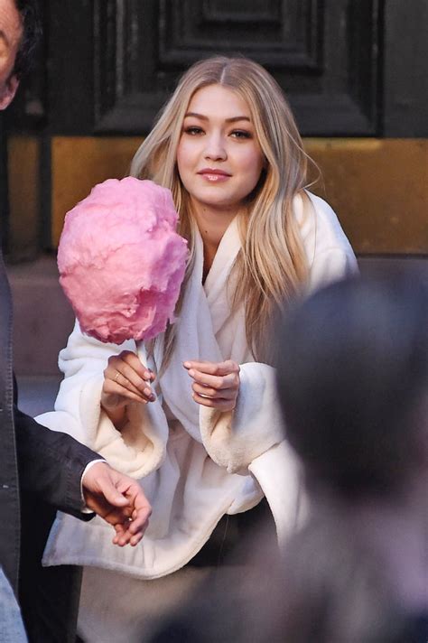 gigi was also seen eating some cotton candy gigi hadid wearing leather pants at a photo shoot