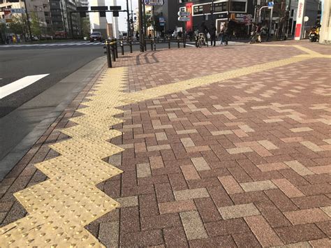 follow  yellow brick roads japans tactile paving blocks samurai