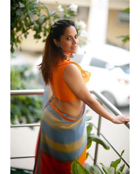 Anasuya Bharadwaj Hot Look In Silk Saree And Orange Blouse