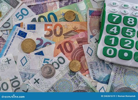 calculator  polish zloty  euro banknotes stock image image  bank closeup