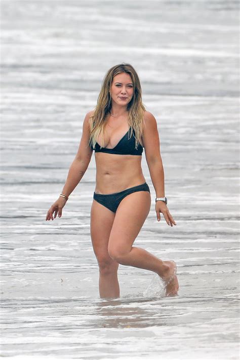 Hilary Duff Slays In A Black Bikini While Enjoying A Beach Day With Her