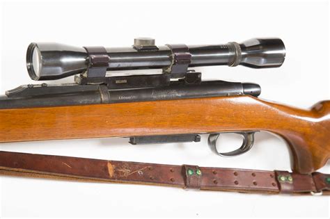 remington model  bolt action mm rifle  weaver marksman  scope