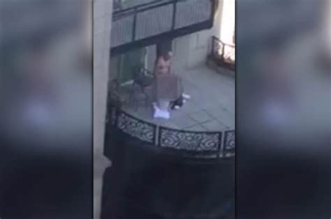 two brazen women caught performing graphic sex act on man on hotel balcony daily star